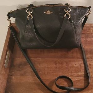 Black leather Coach bag with protective silk bag.